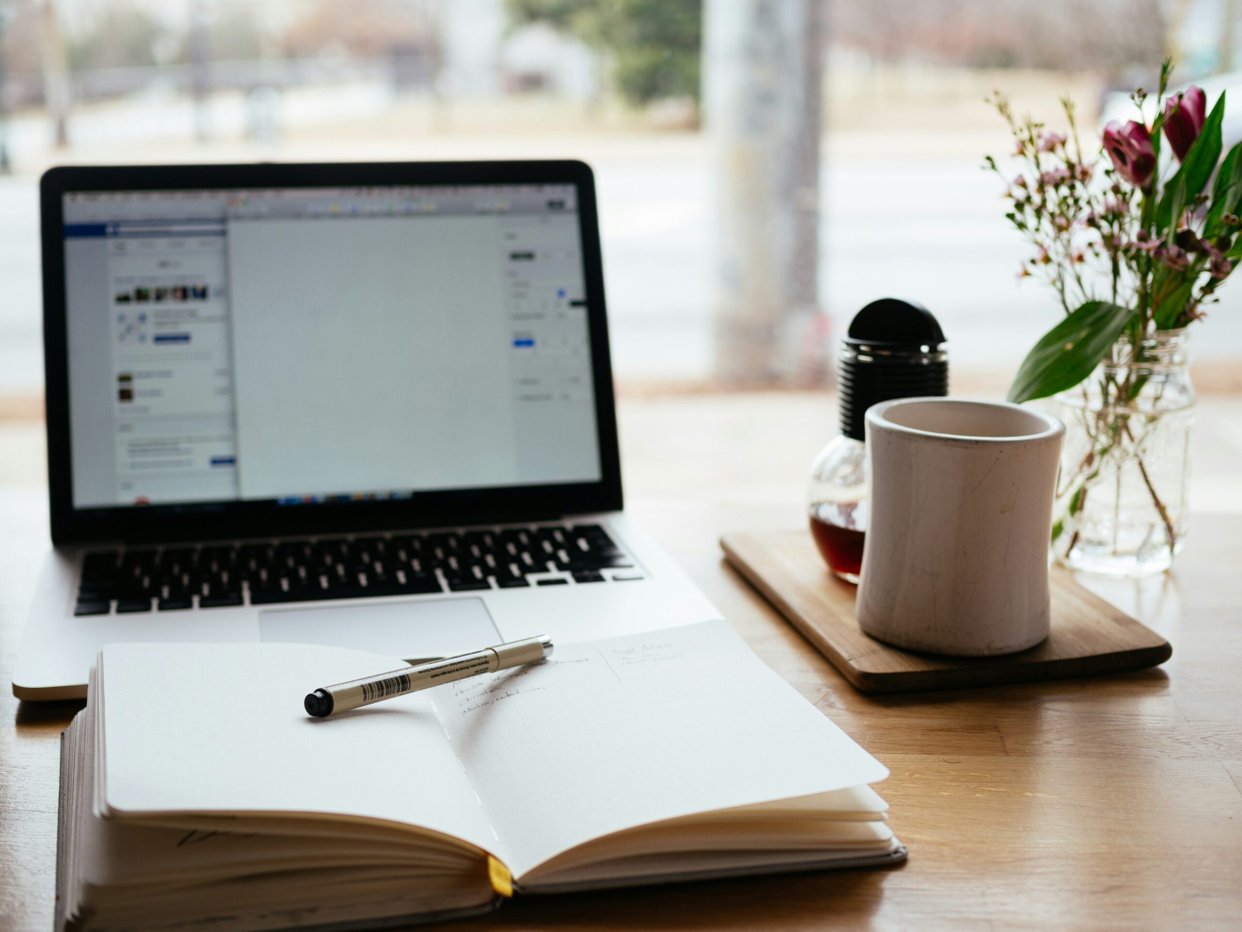 Level Up Your Skills: 25 Online Classes for Personal and Professional Growth 9 MacBook Pro near white open book